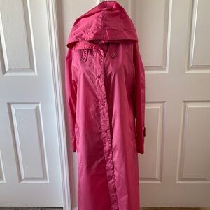 Raincoat maxi full length with hoodie. Snap front closure.